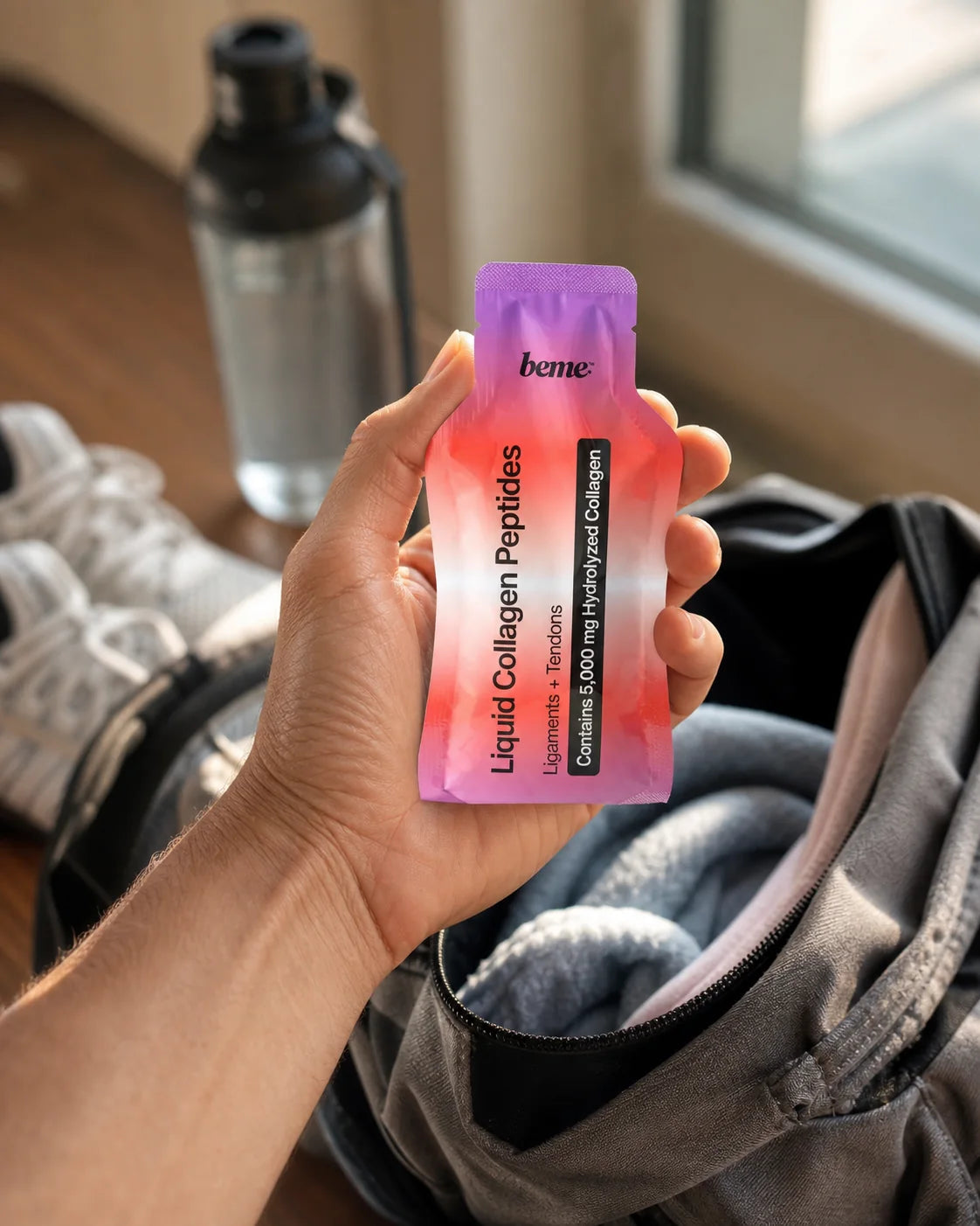 PROTECT ready-to-drink sachet beside a training bag